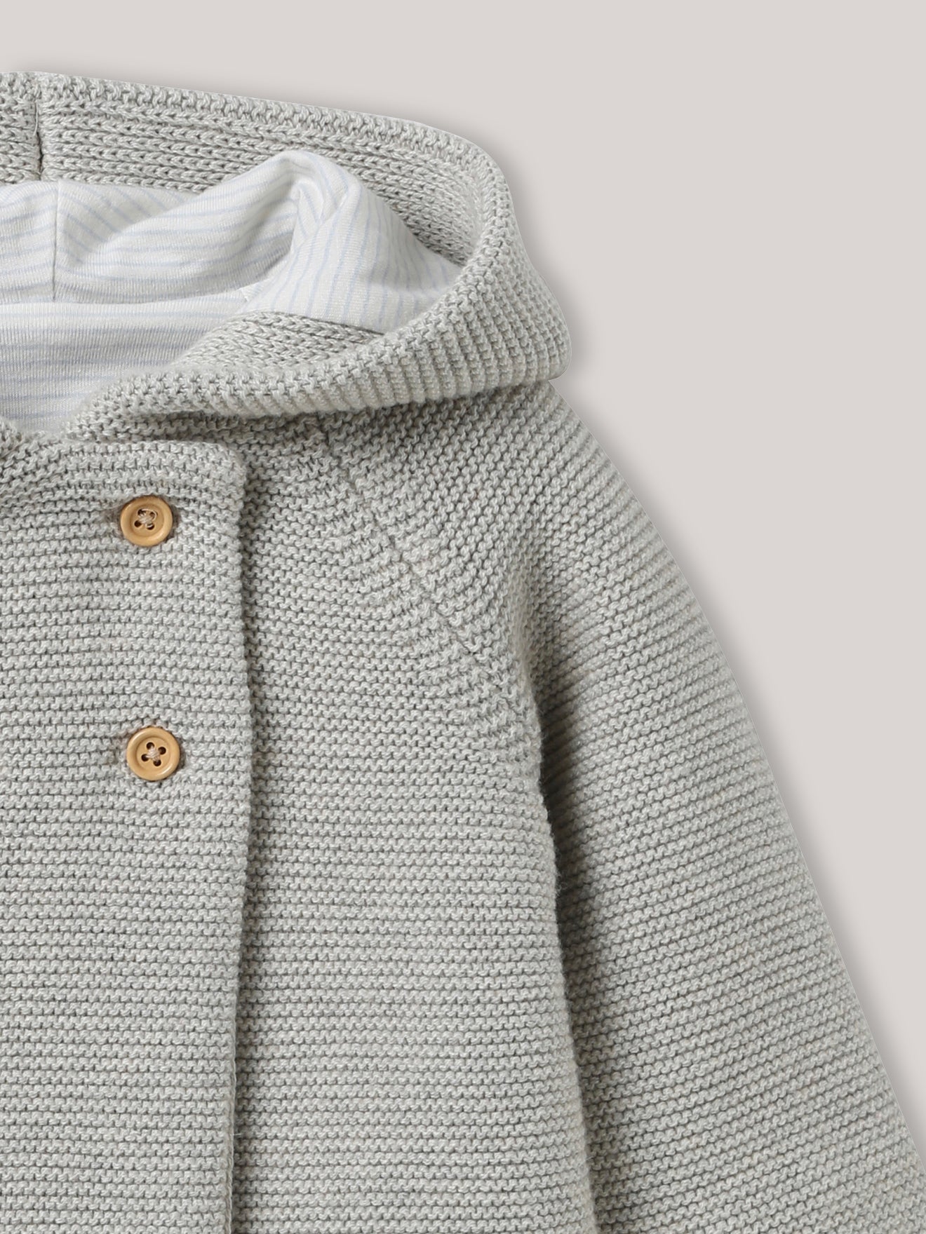 Baby-Strickjacke aus Baumwolle und Wolle, gefüttert