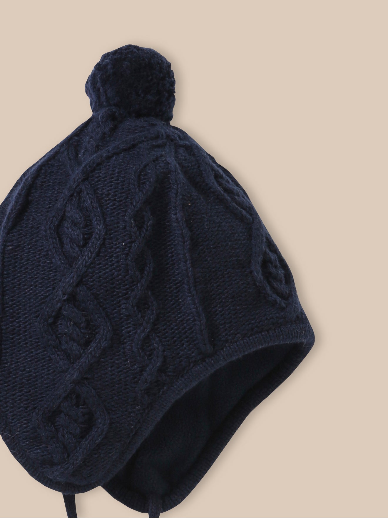 Baby-Peru-Mütze aus Wolle mit Fleece-Futter