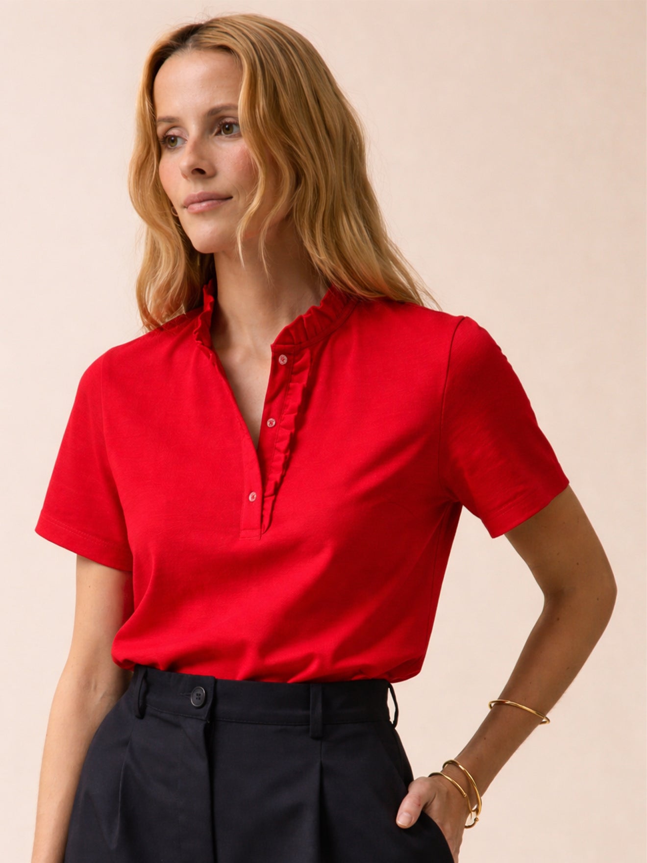Damen-Poloshirt mit Volants am Kragen