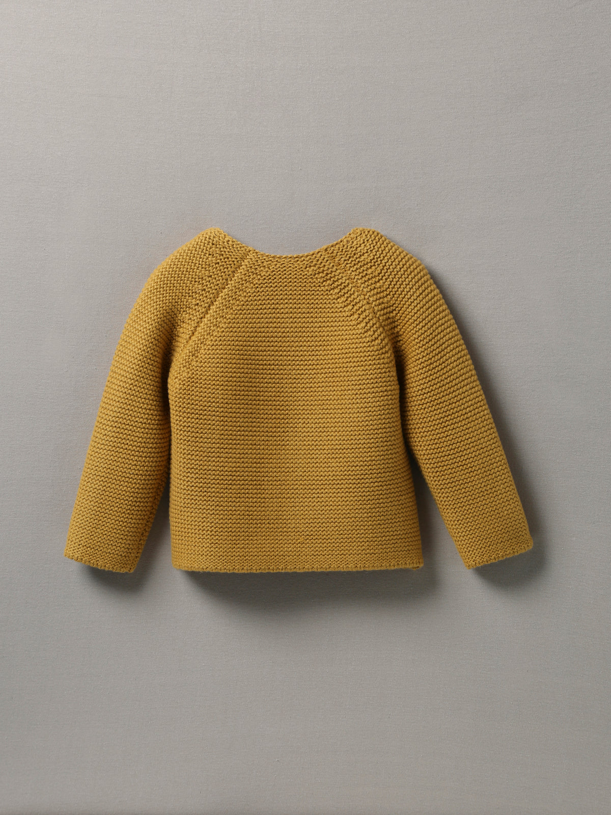 Baby-Strickjacke aus Wolle und Bio-Baumwolle