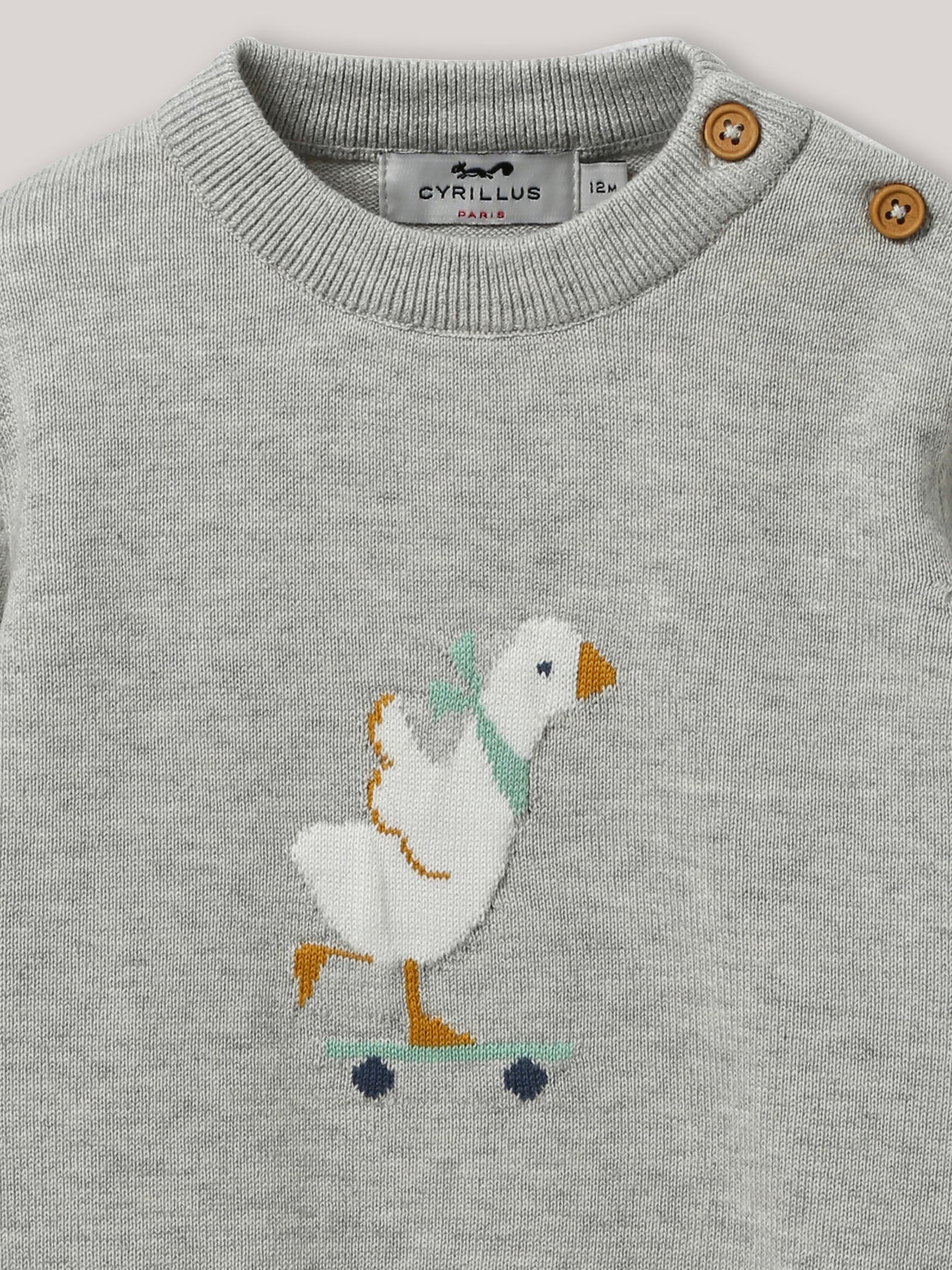 Baby-Pullover aus Bio-Baumwolle und Wolle mit « Gänse »-Motiv