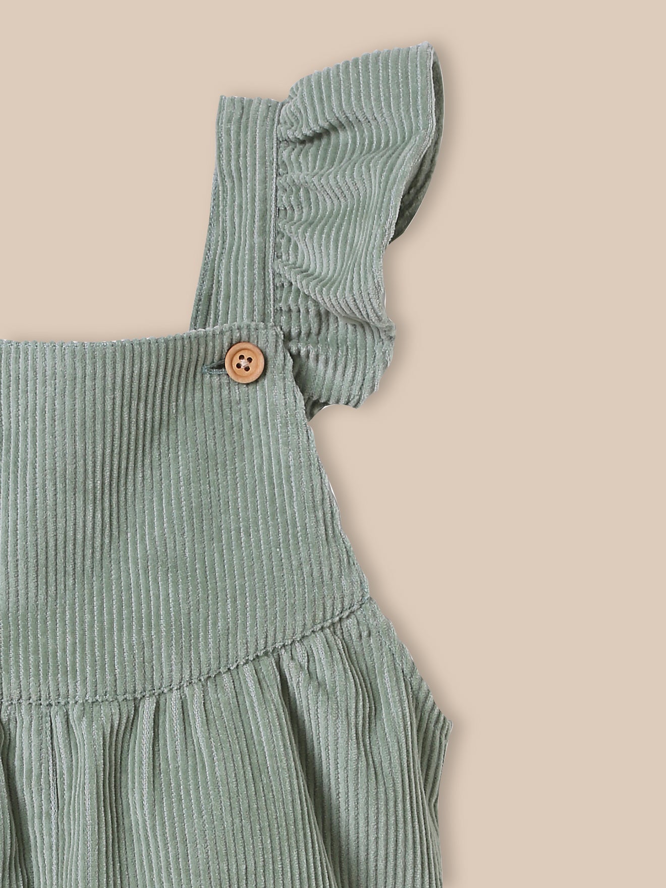 Baby-Latzhose aus Velours mit breiten Rippen
