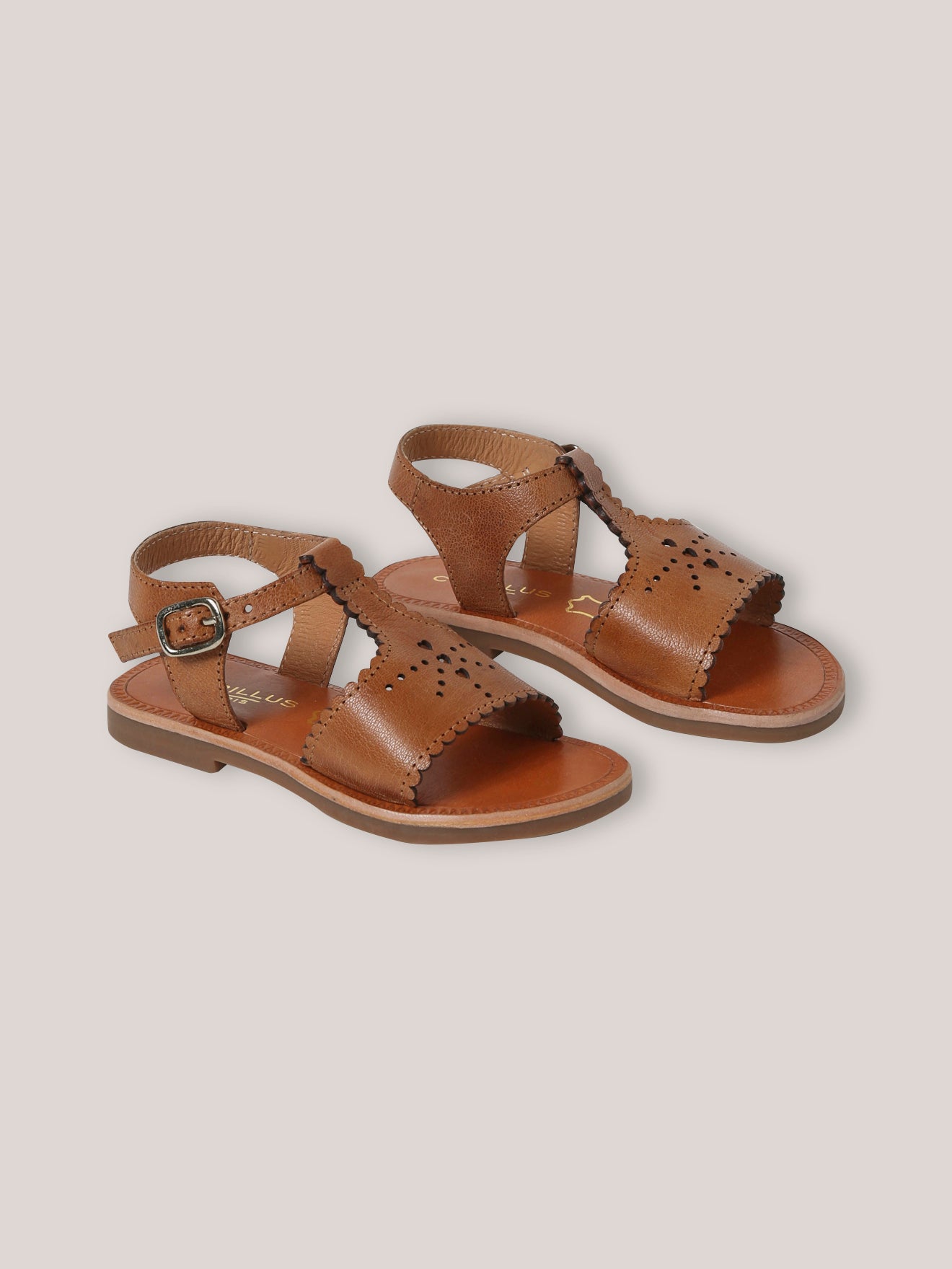 Mädchensandalen aus Leder mit Festonborte