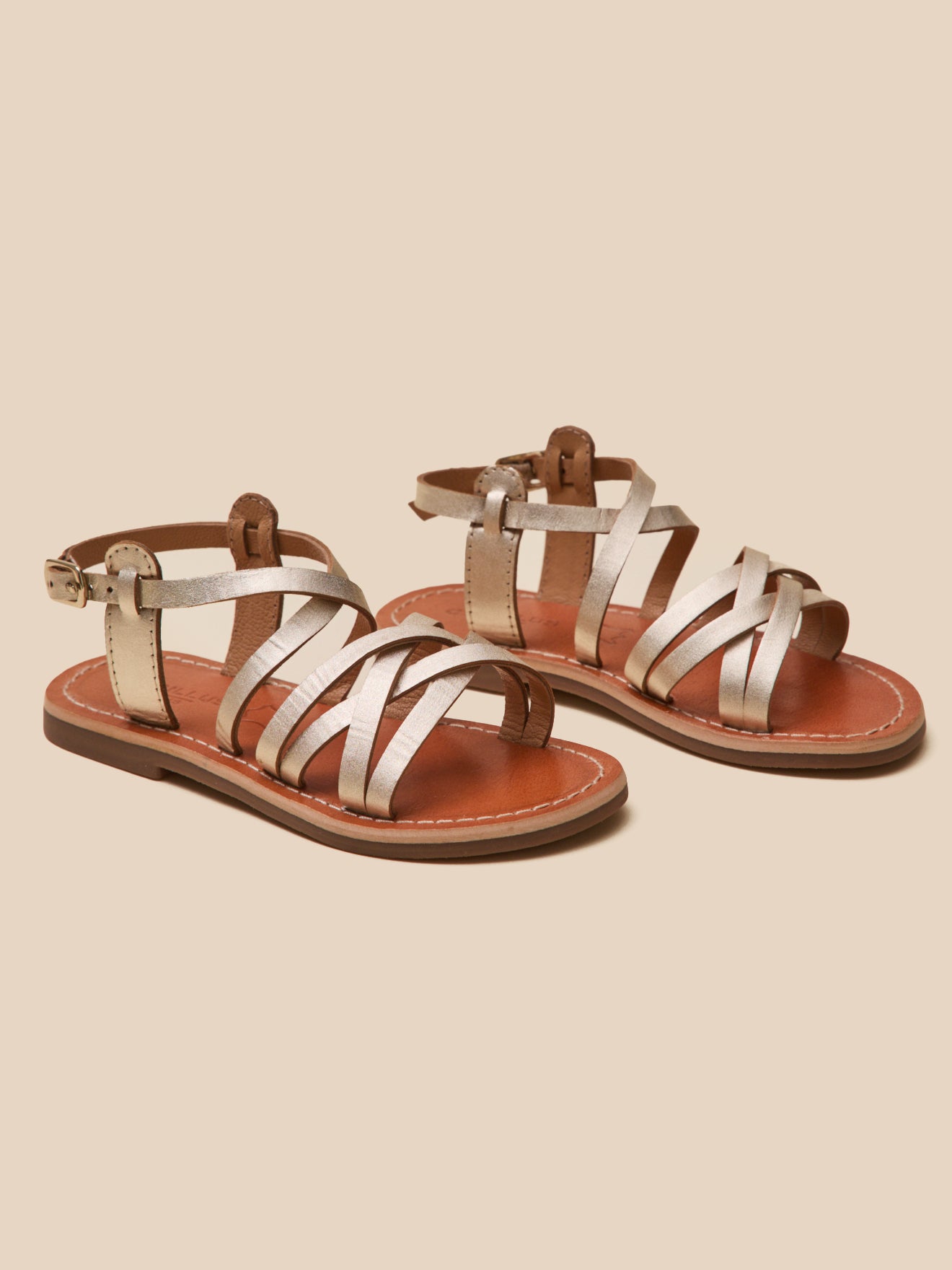Mädchen-Sandalen aus goldfarbenem Leder
