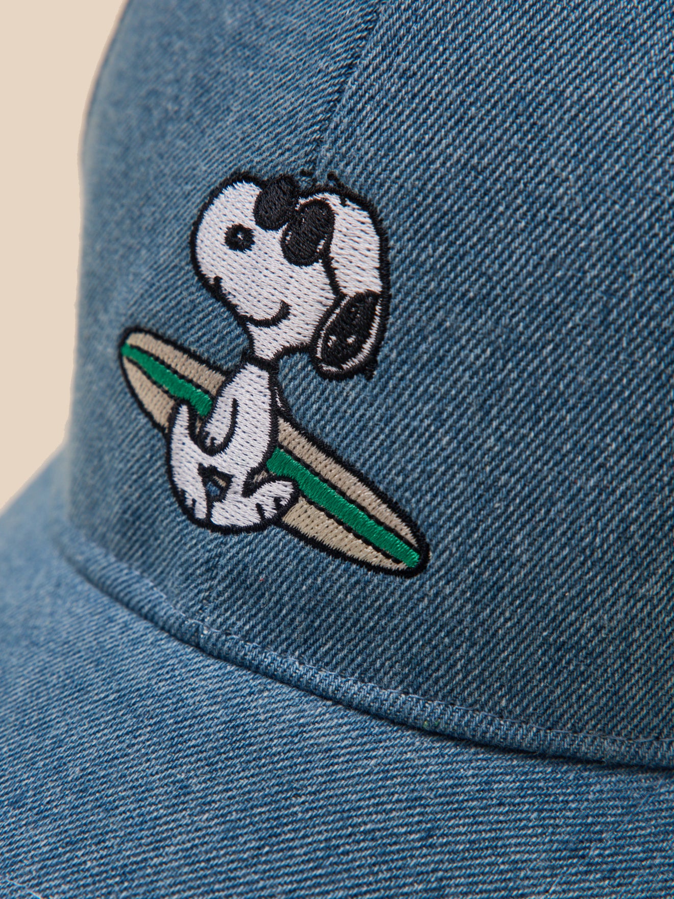 Junior-Cap Cyrillus x PEANUTS® « Kollektion Snoopy® »
